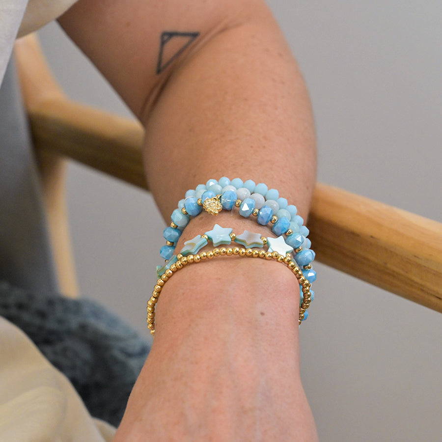 Five Stack Bracelets in Pale Blue with Gold Seashell