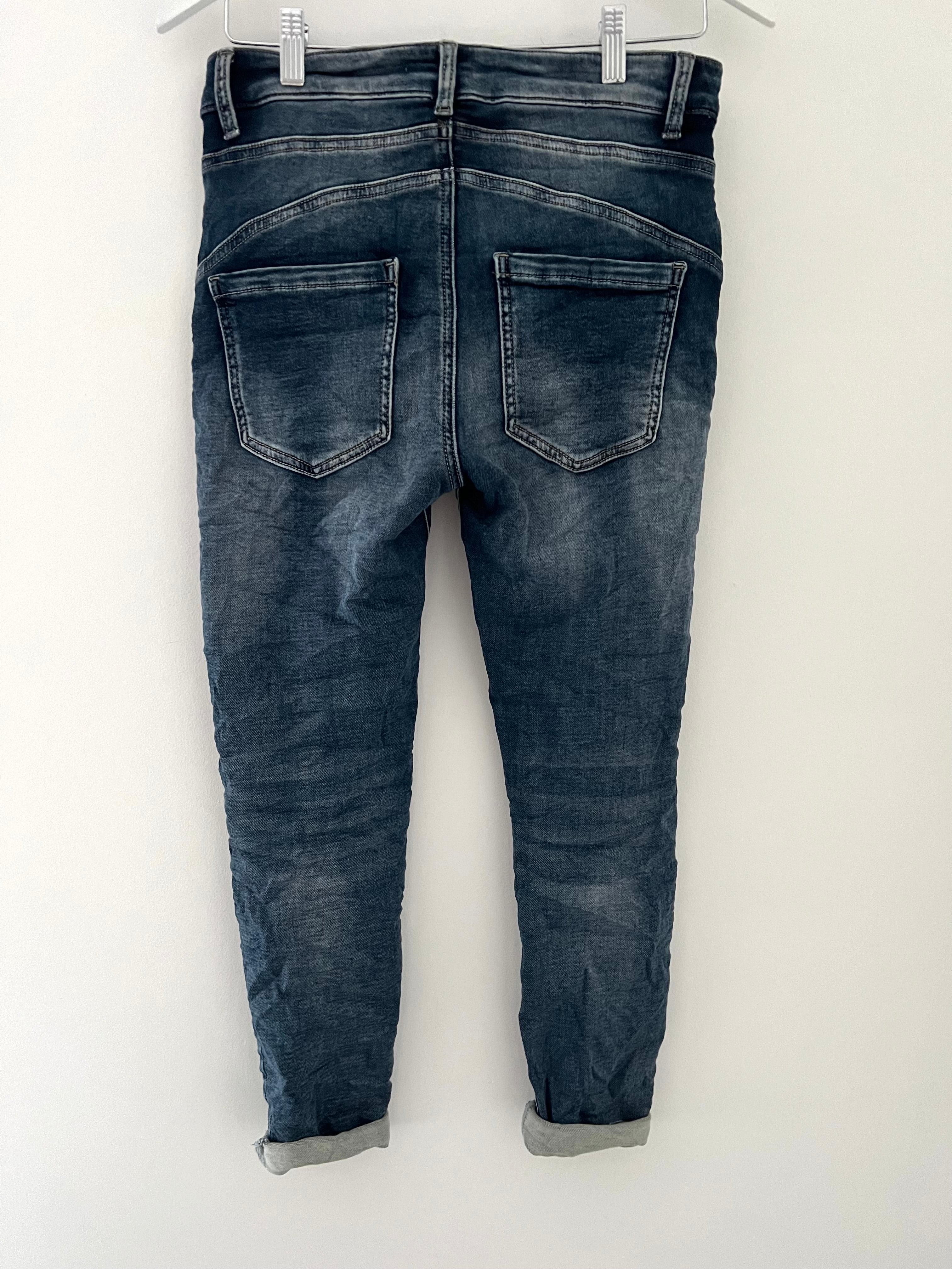 Covered Button Fly Stretch Jeans in Mid Denim